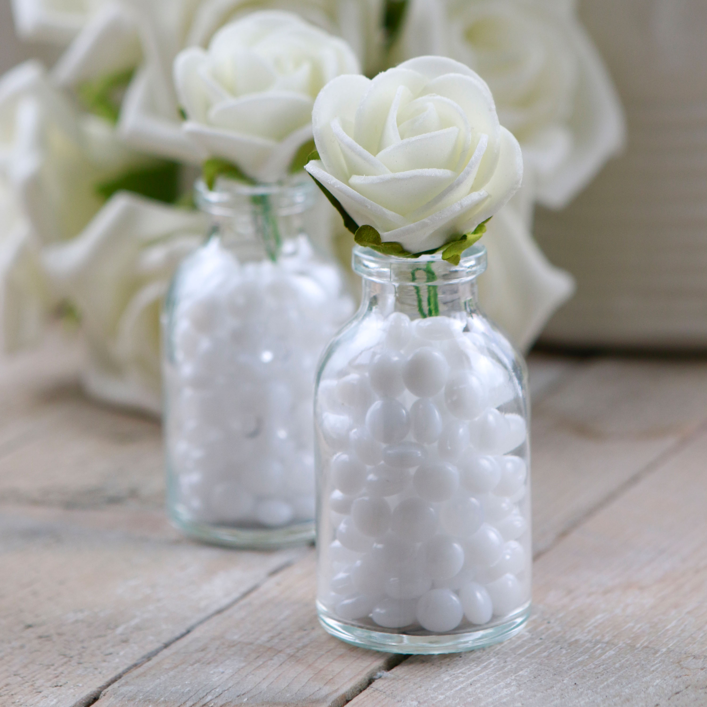 22019-22119-28072-31121-glass-bottle-h-10cm-with-foam-roses-1