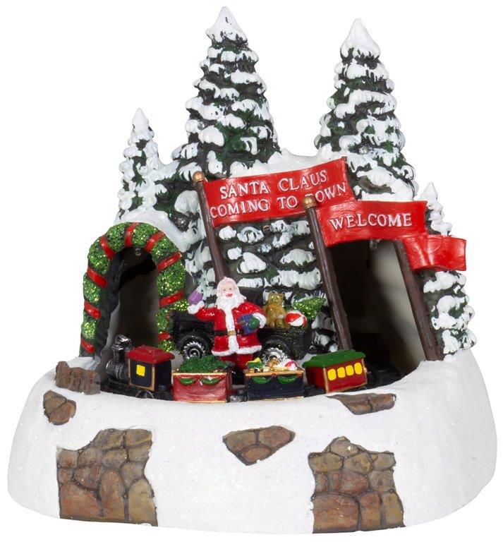 Winterlandschaft mit LED-Beleuchtung und fahrendem Zug