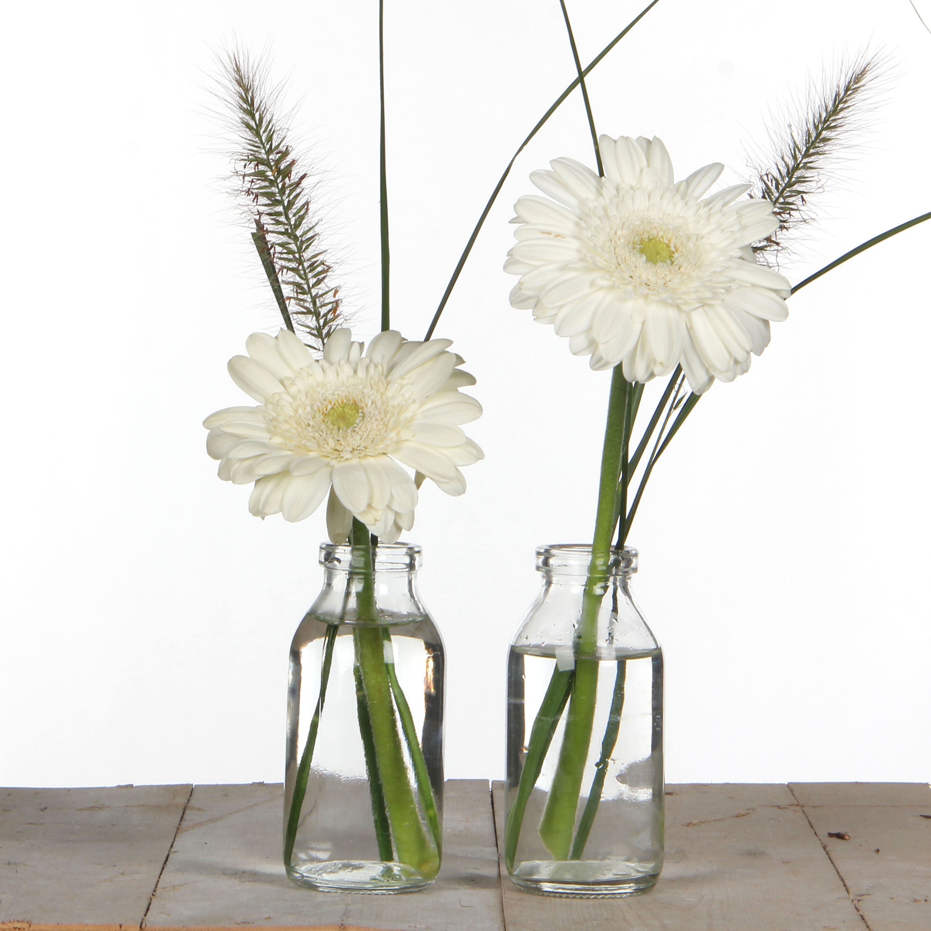28072-bottle-h-10-cm-with-flower-1